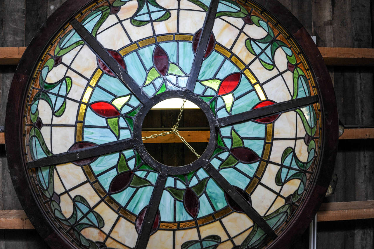 A monumental sized glass-in-lead Art Nouveau ceiling light, bar look 1